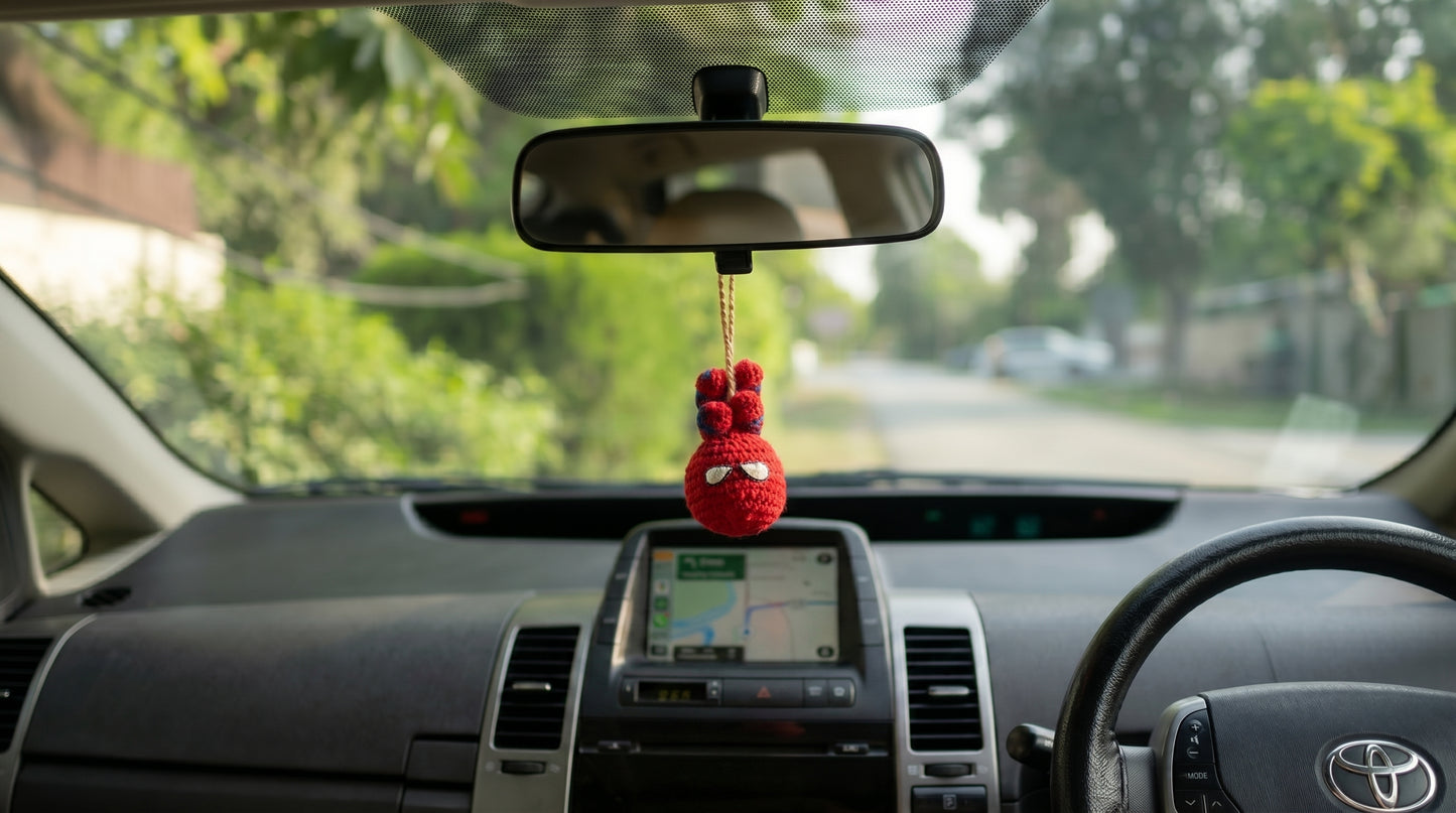 Car hanging Spider-Man