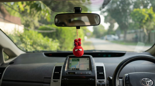 Car hanging Spider-Man